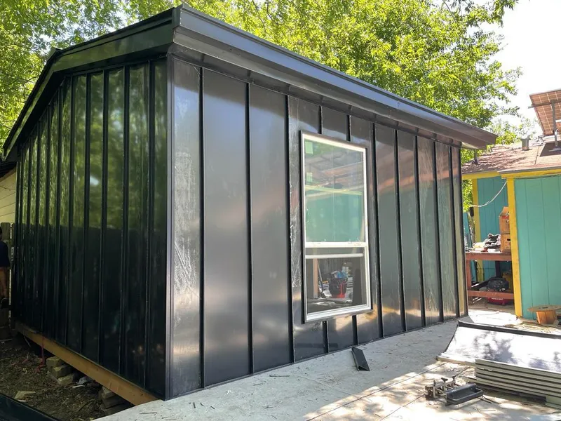 Black standing seam metal wall panels for Roof Inspection in Mundelein